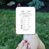 classic-black-and-white-wedding-program-fans-with-detailed-timeline